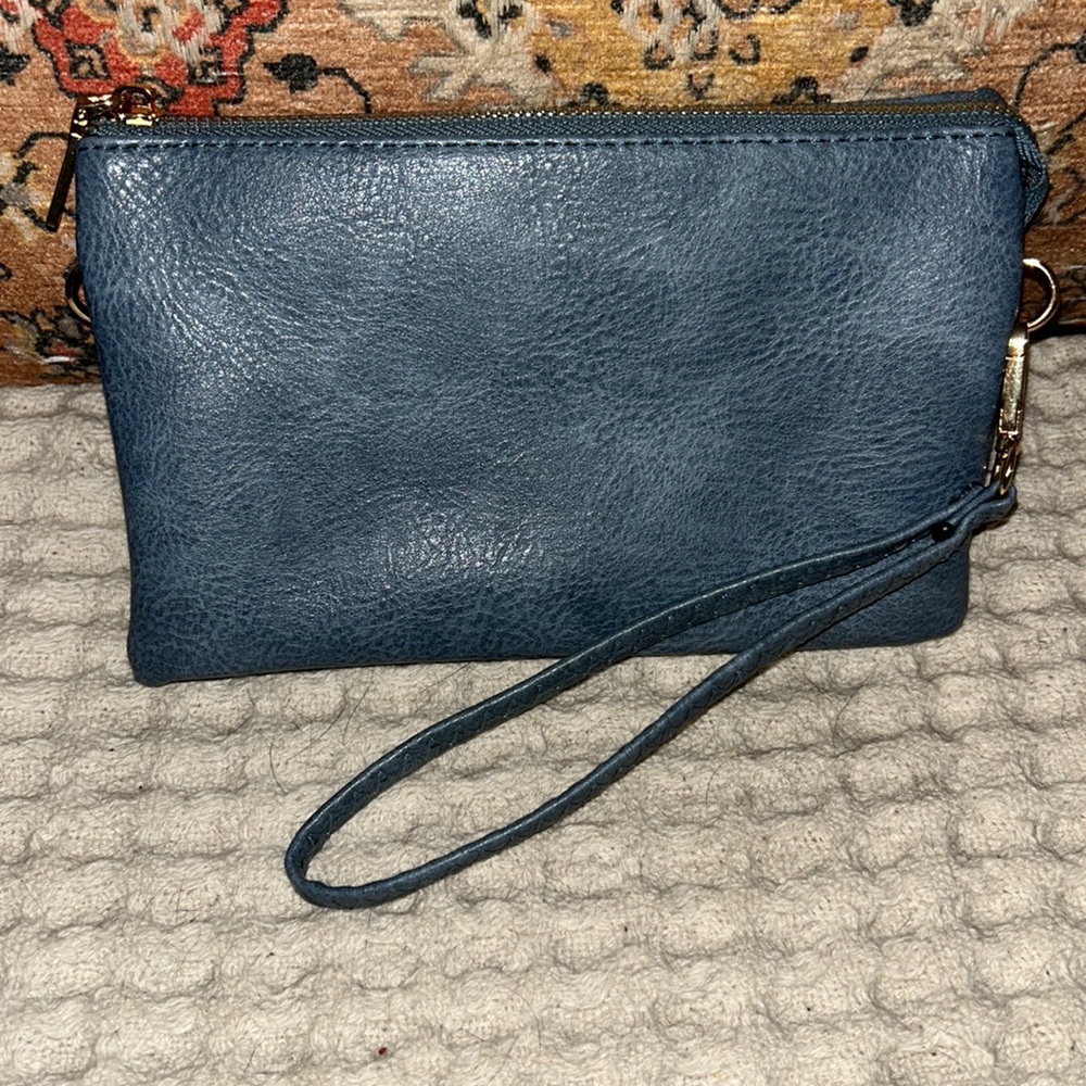 Gently used Jen&Co. wristlet Indigo.